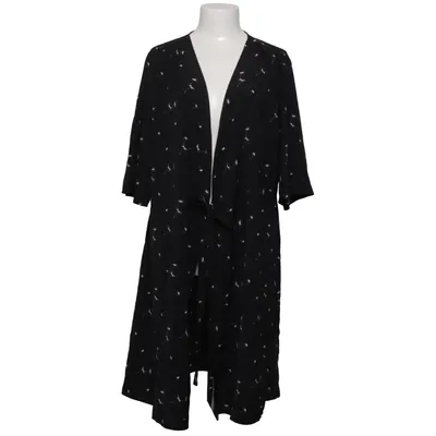 Omlottklänning (Svart, Vit) från Disturbia Polyester