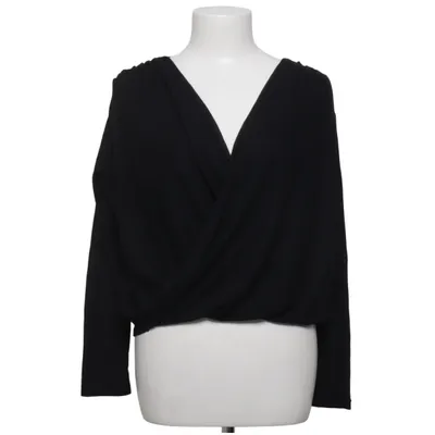 Wikkeltop (Twisted Jersey Top) van Notion 1.3 Polyester, Viscose