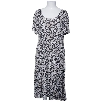 Jurk (Zwart, Wit, Beige) van Joy s Elastaan, Polyester