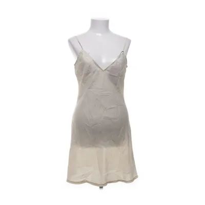 Slip (Beige) from Sisters Polyester