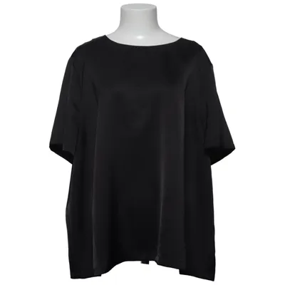 Topp (Extracted product information from images.) från XLNT by KappAhl Polyester