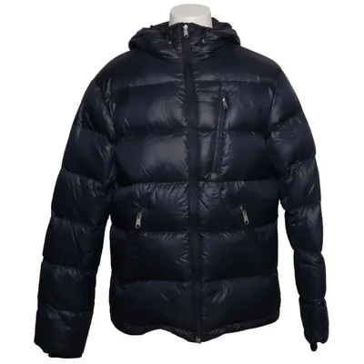 Dunjacka (Blå) från Peak Performance Dun, Fjädrar, Polyamid, Återvunnen polyester