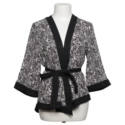 Haut portefeuille (Noir, Blanc) de Phildar Élasthane, Polyester