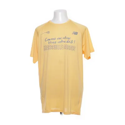 T-shirt (Gul) från New Balance Polyester