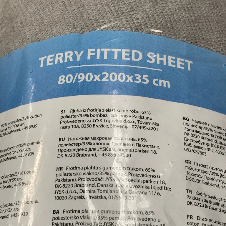 Dra-på-lakan (Grå) från Jysk Bomull, Polyester - Materialetikett