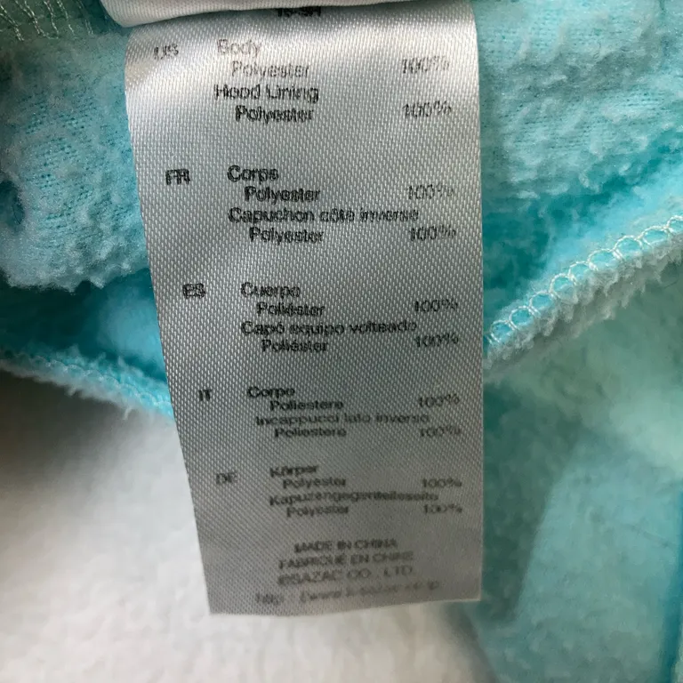 Mjukisdräkt (Turkos, Flerfärgad) från Sazac Island Polyester - Materialetikett