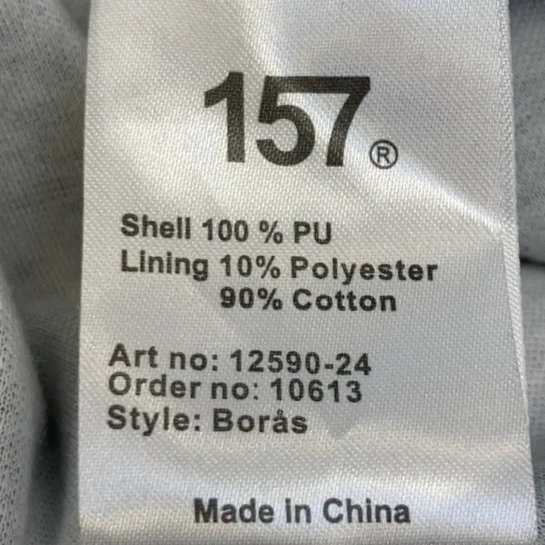 Regnrock (Svart) från Lager 157 Polyuretan, Polyester, Bomull - Materialetikett