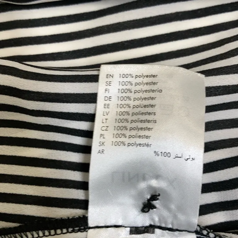 Skjortklänning (Svart, Vit) från Lindex Polyester - Materialetikett