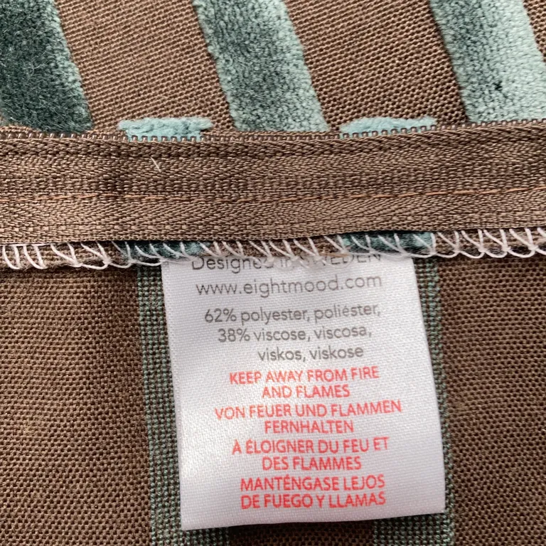 Kuddfodral (Brun) från Eight Mood Polyester, Viskos - Materialetikett
