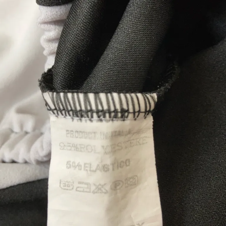 Topp (Svart, Vit) från Top Trendy Elastan, Polyester - Materialetikett