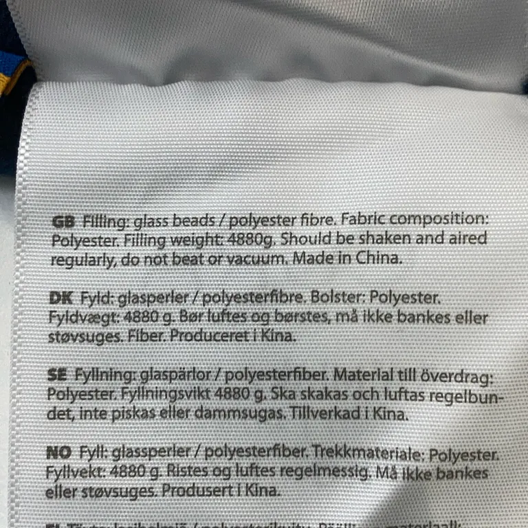 Tyngdtäcke (Blå) från CURA of Sweden Polyester - Materialetikett