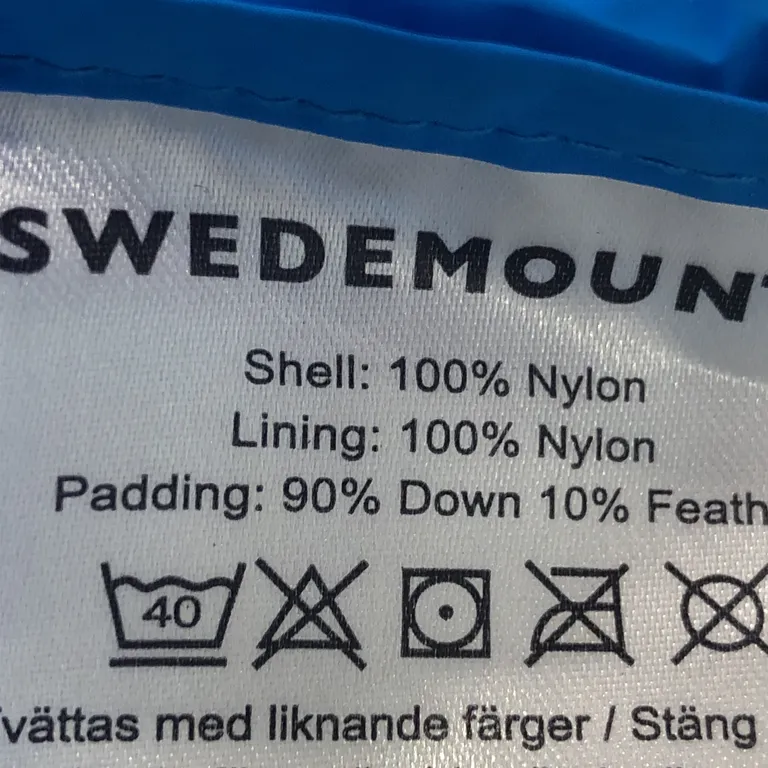 Dunjacka (Blå) från Swedemount Nylon, Dun - Materialetikett