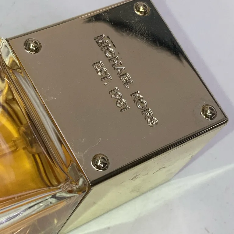 Eau de Parfum (Sexy Amber) från Michael Kors - Repig - Yta