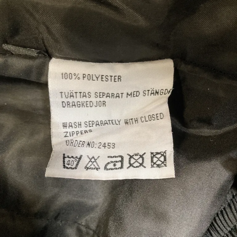 Kjol (Svart) från Dobsom Polyester - Materialetikett