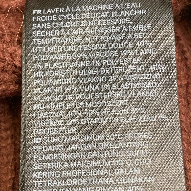 Beaniemössa (Brun) från H&M Polyamid, Viskos, Elastan, Polyester, Akryl - Materialetikett