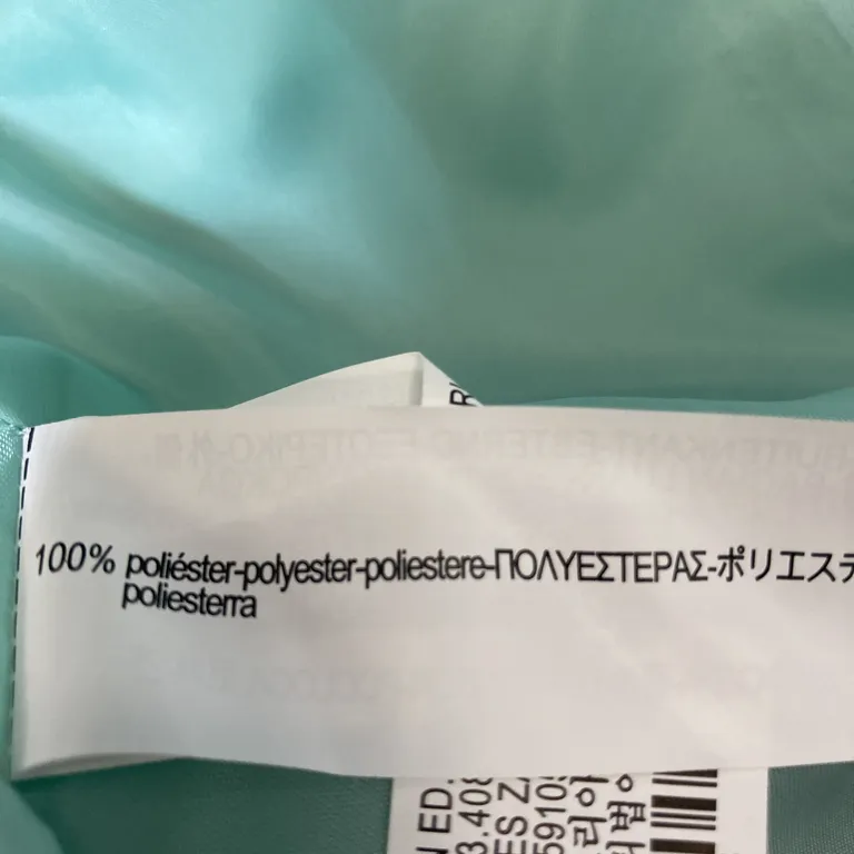 Kostym (Turkos) från Zara Polyester - Materialetikett