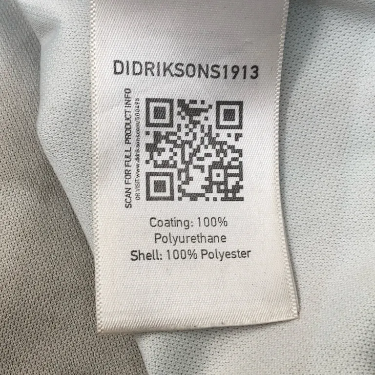 Regnjacka (Grön) från Didriksons 1913 Polyester, Polyuretan - Materialetikett