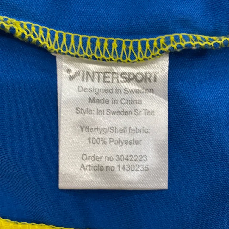 Fotbollströja (Blå, Gul) från Intersport Polyester - Materialetikett