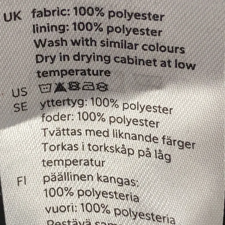 Överdragsbyxor (Svart) från Lindex Kids Polyester - Materialetikett