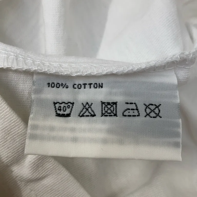 T-shirt (Svart, Vit) från Fienden Bomull - Materialetikett