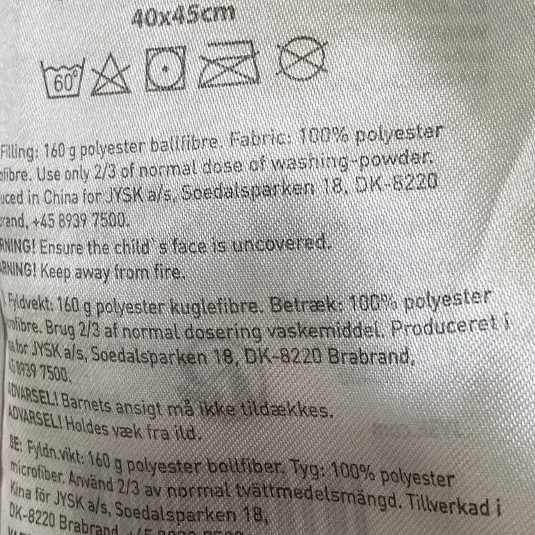Huvudkudde (Vit) från Jysk Polyester - Materialetikett