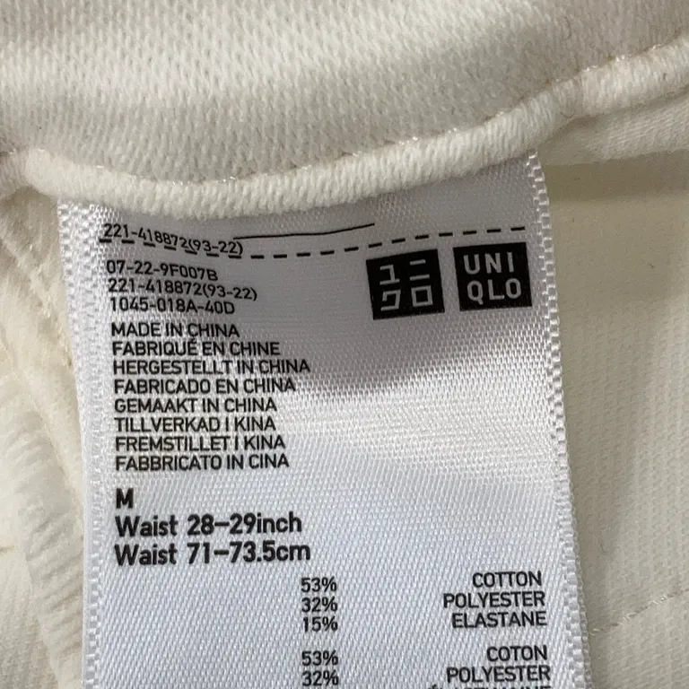 Pantalon (Blanc) de Uniqlo Coton, Élasthane, Polyester - Marque