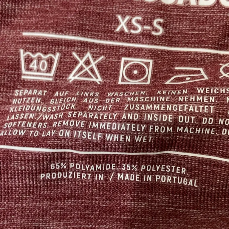 Träningstopp (Rosa) från Gymbassador Polyamid, Polyester - Materialetikett