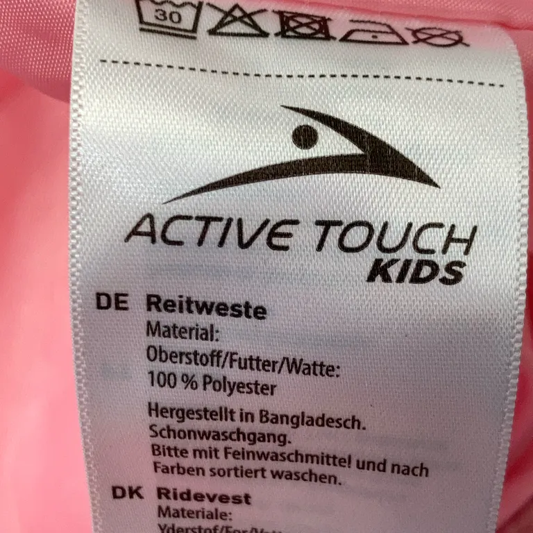 Ytterväst (Rosa) från Riding Camp Polyester - Materialetikett