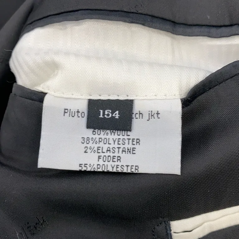 Kostym (Svart) från Bläck Polyester - Materialetikett
