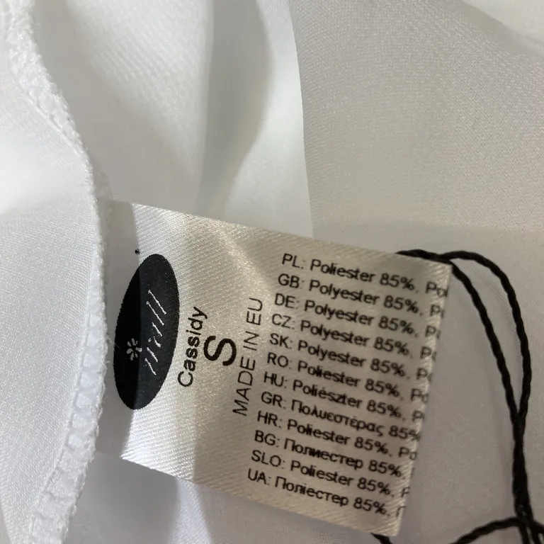 Negligé (Vit) från Irall Polyester - Materialetikett