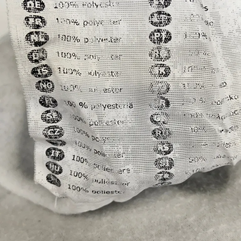 Filt (Vit, Flerfärgad) från IKEA Polyester - Materialetikett