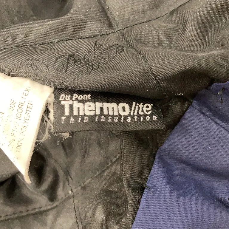 Jacka (Gul) från Peak Performance Goretex, Polyester - Materialetikett