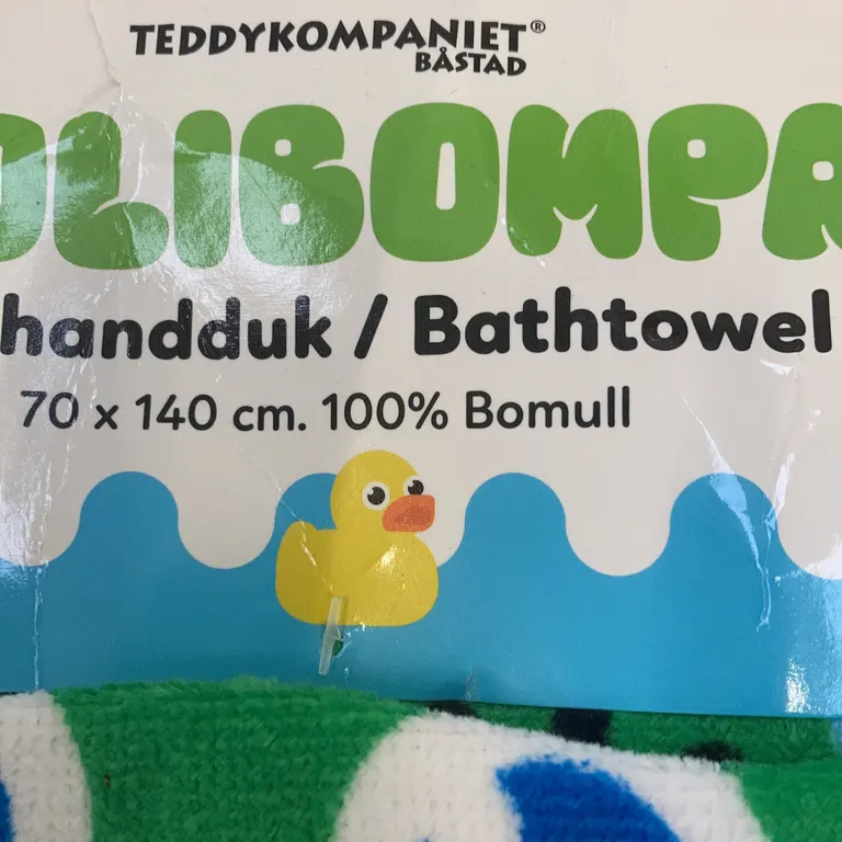 Handduk (Blå, Flerfärgad) från Bolibompa Bomull - Materialetikett