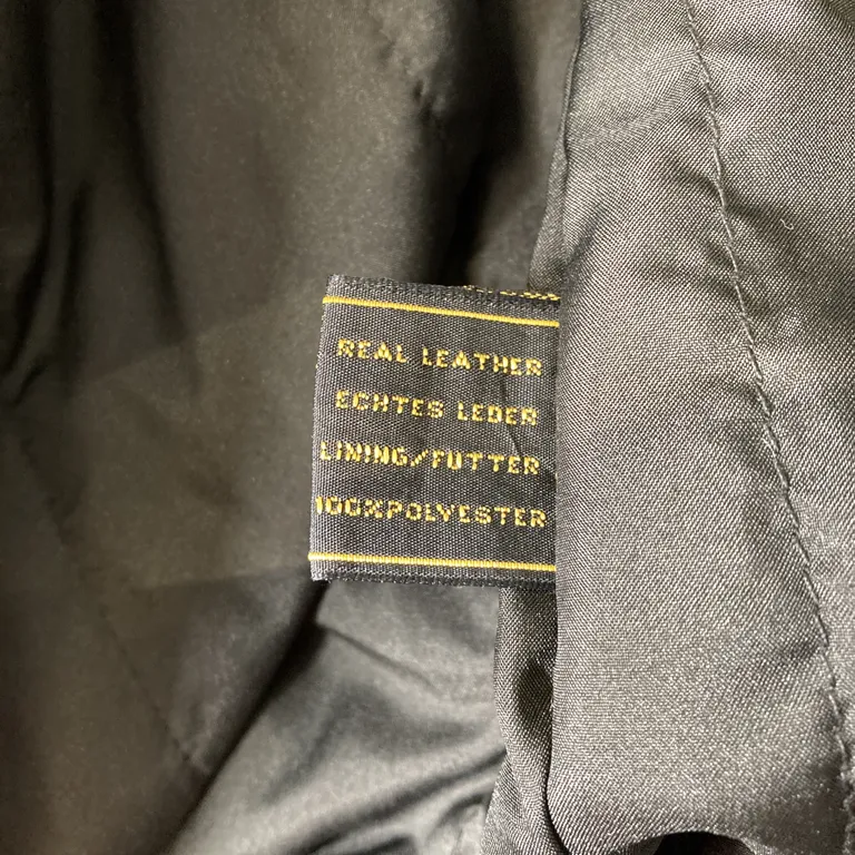 Läderrock (Svart) från Havgårds  Päls Skinn, Polyester - Materialetikett