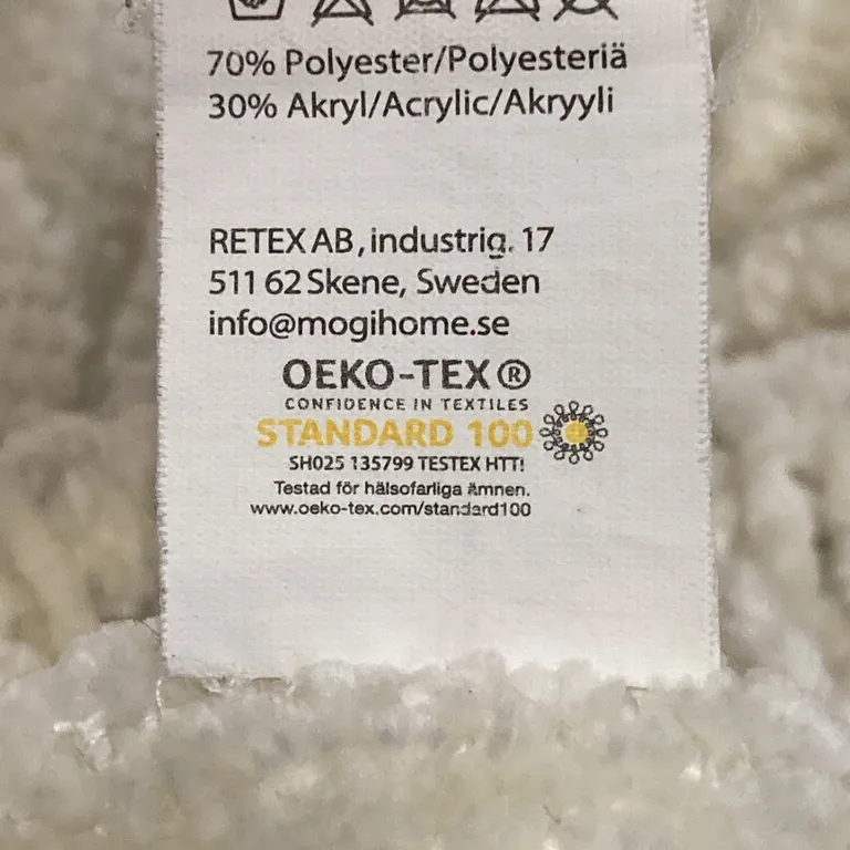 Pläd (Beige) från Mogihome Polyester, Akryl - Materialetikett