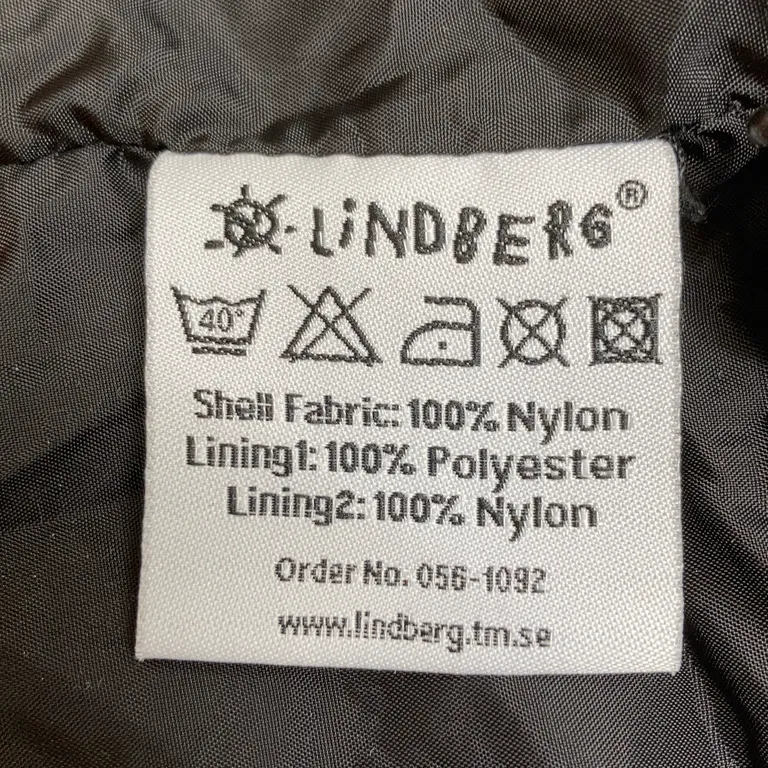 Skaljacka (Flerfärgad) från Lindberg Nylon, Polyester - Materialetikett