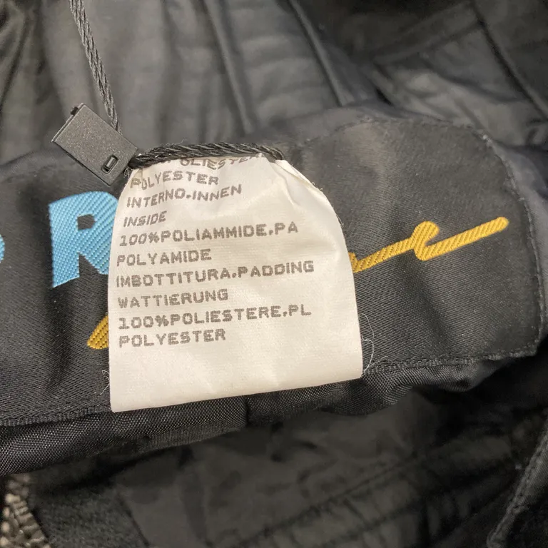 Överdragsbyxor (Svart) från Pro Polyester, Polyamid - Materialetikett