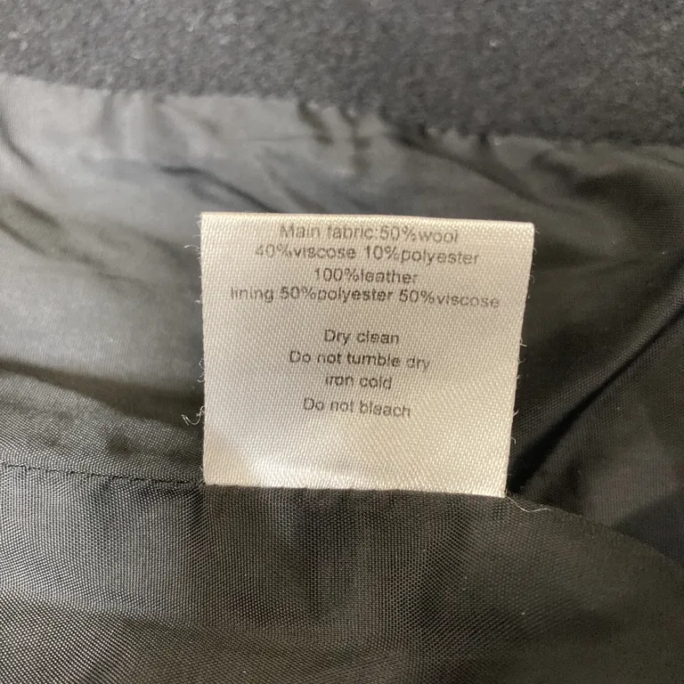 Kappa (Svart) från Stylein Ull, Viskos, Polyester, Skinn - Materialetikett