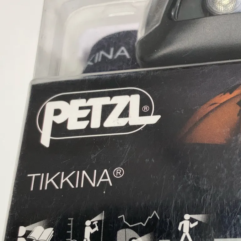 Pannlampa (Svart) från Petzl - Varumärke