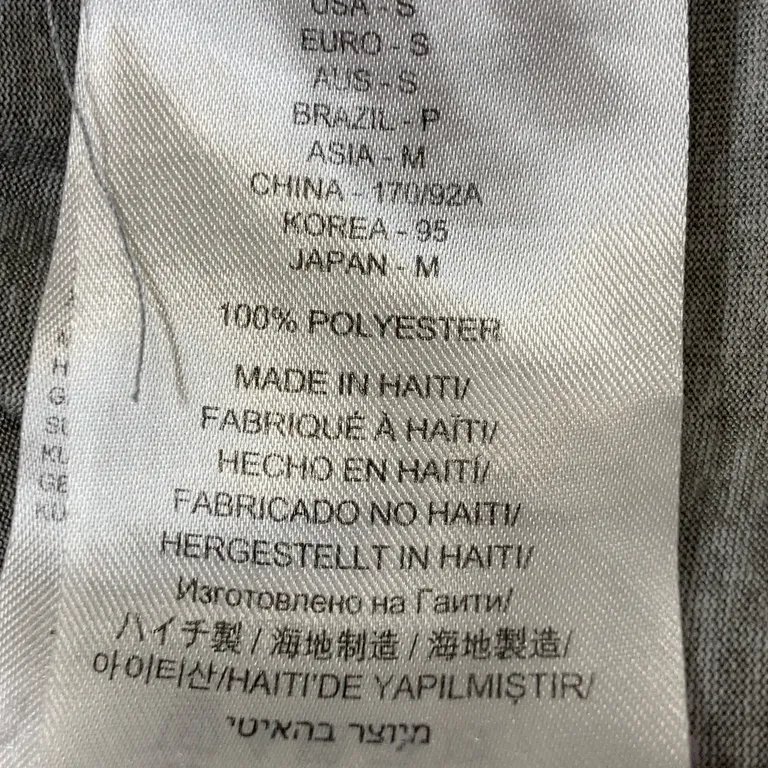 T-shirt (Grå) från New Balance Polyester - Materialetikett