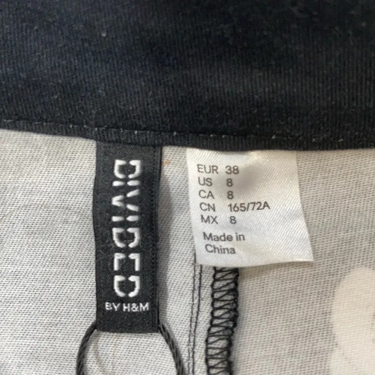 Kjol (Svart, Flerfärgad) från Divided by H&M - Varumärke