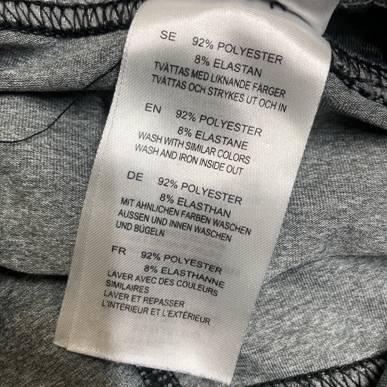 Träningstights (Grå, Svart) från Röhnisch Polyester, Elastan - Materialetikett