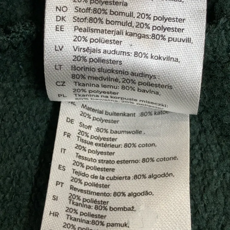 Mjukisset (Grön) från Lindex Bomull, Polyester - Materialetikett