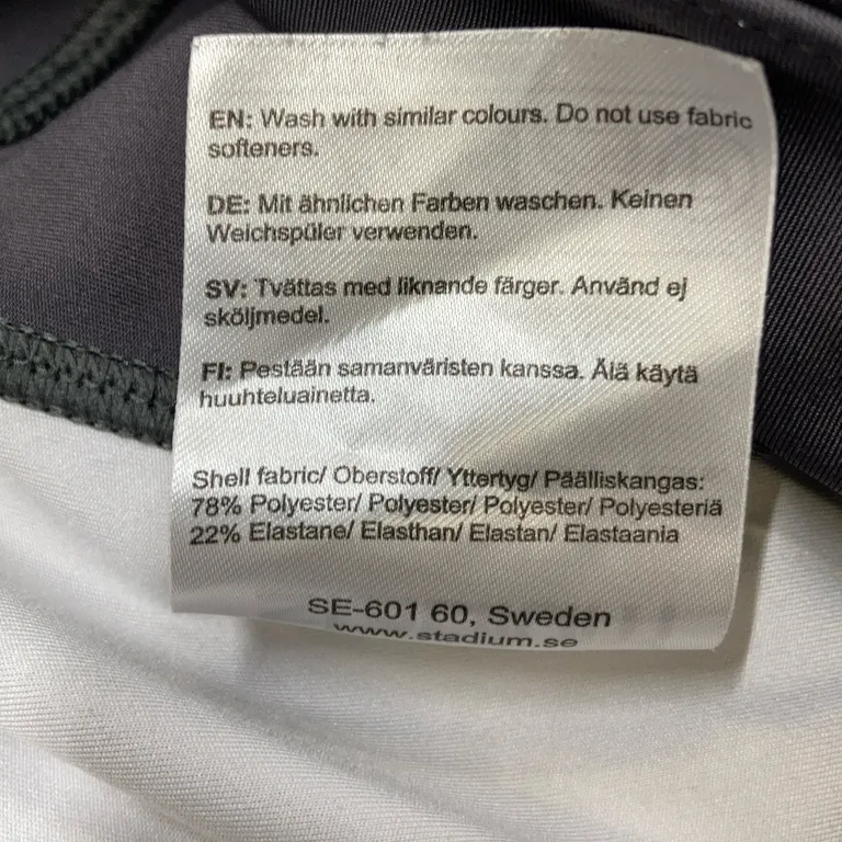 Träningstights (Flerfärgad) från Stadium Polyester, Elastan - Materialetikett