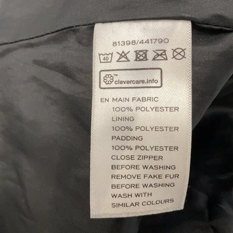Jacka (Svart) från KappAhl Polyester, Päls - Materialetikett