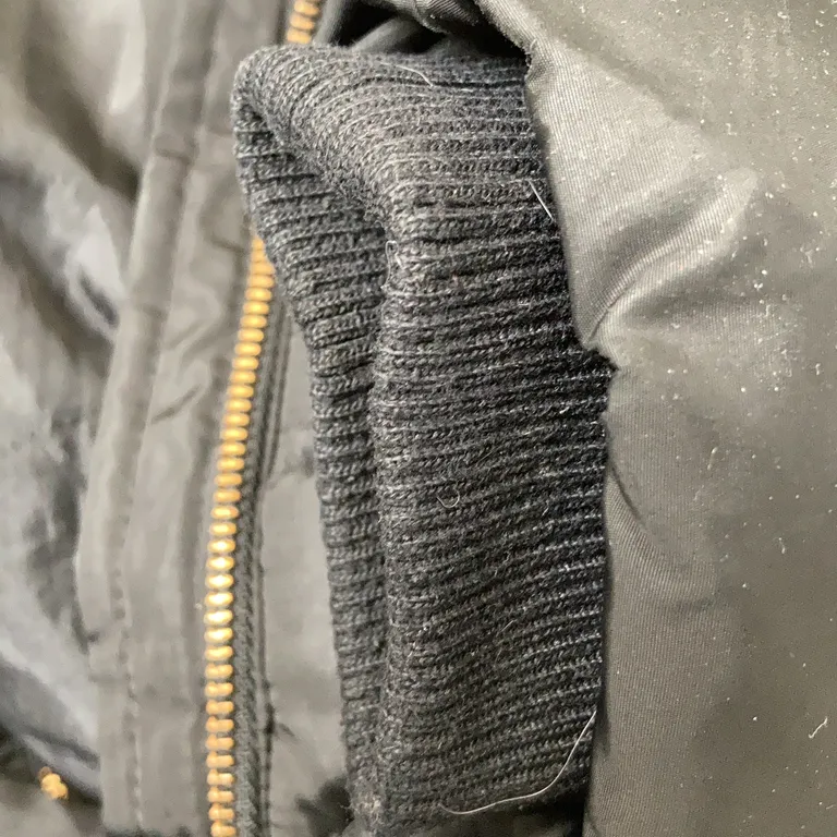 Jacka (Svart) från KappAhl Polyester, Päls - Nopprig - Ärmslut