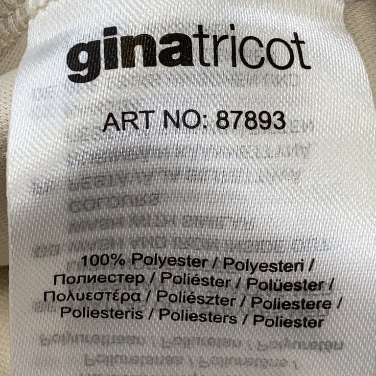 Läderbyxor (Skinnbyxor i bootcut modell med dragkedja i sidan) från Gina Tricot Polyester - Materialetikett