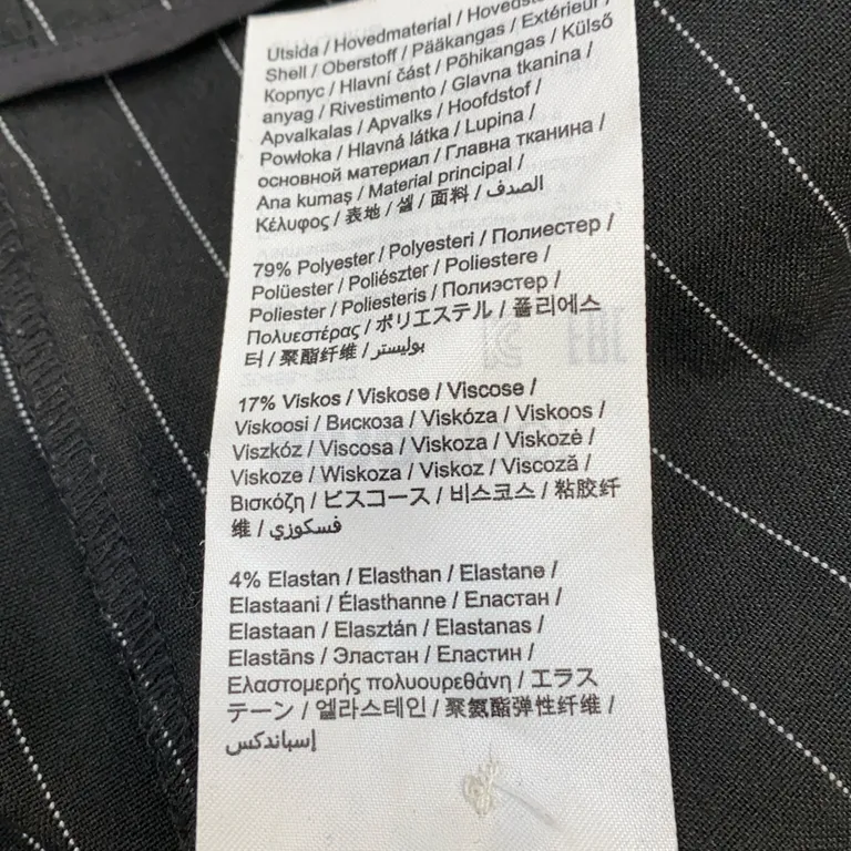 Byxor (Svart) från Gina Tricot Elastan, Polyester, Viskos - Materialetikett