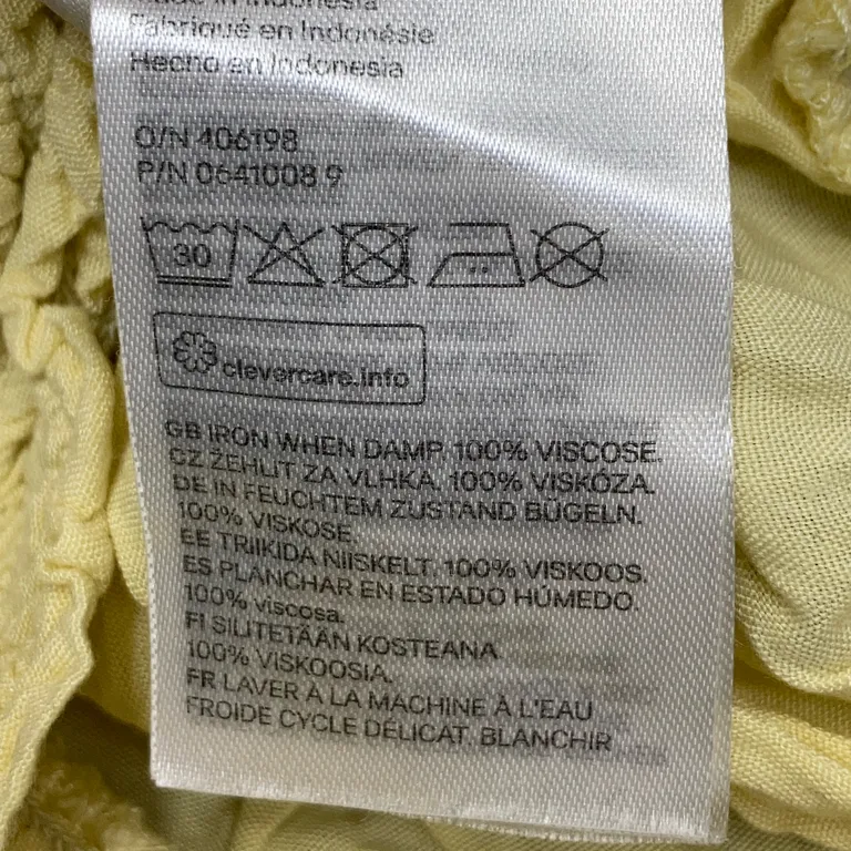 Blus (Gul) från H&M Viskos - Materialetikett