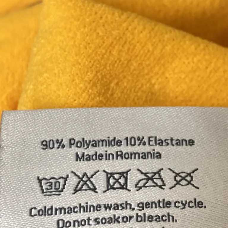 Baddräkt (Gul) från Oas Polyamid, Elastan - Materialetikett